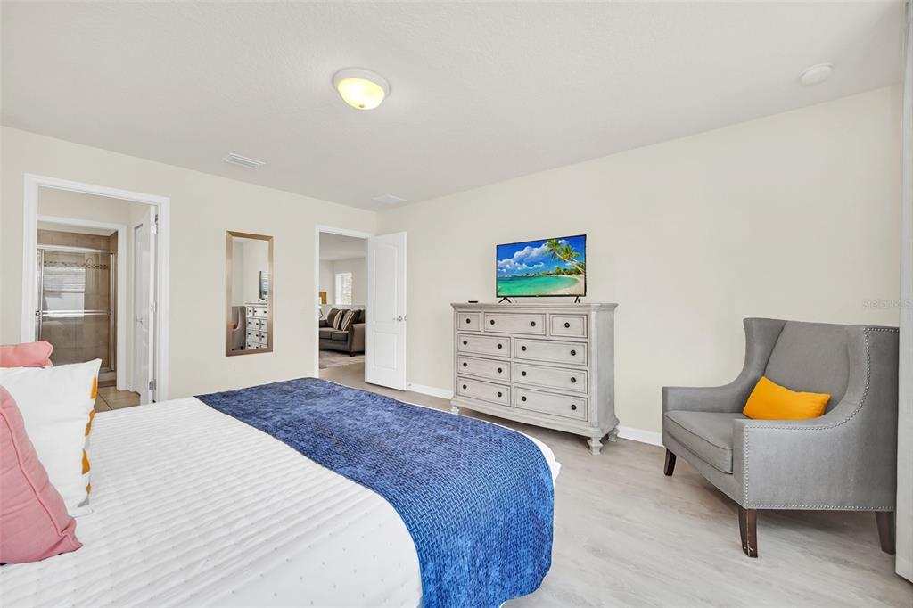 2070 Rome Drive Kissimmee, FL 34747 - Photo 32 of 57 a bedroom with a bed and dresser