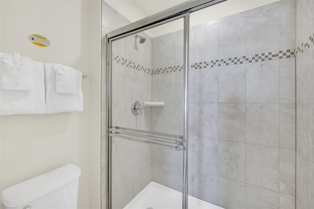 2070 Rome Drive Kissimmee, FL 34747 - Photo 34 of 57 a bathroom with a shower and a toilet