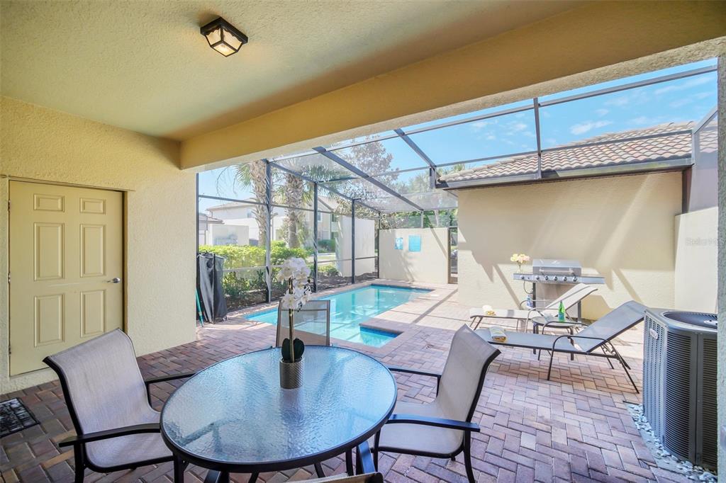 2070 Rome Drive Kissimmee, FL 34747 - Photo 49 of 57 a view of a dining room with furniture window and outside view