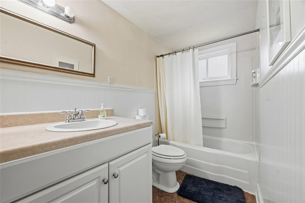 110 South 13th Street Pittsburgh, PA 15203 - Photo 14 of 36 a bathroom with a sink a toilet and shower