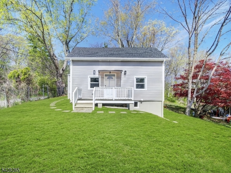 4 Emmans Road Ledgewood, NJ 07852 - Photo 2 of 25 a view of a house with a backyard