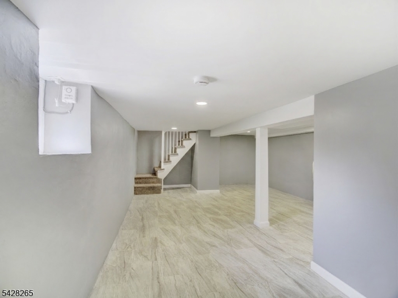 4 Emmans Road Ledgewood, NJ 07852 - Photo 23 of 25 wooden floor in an empty room with a window