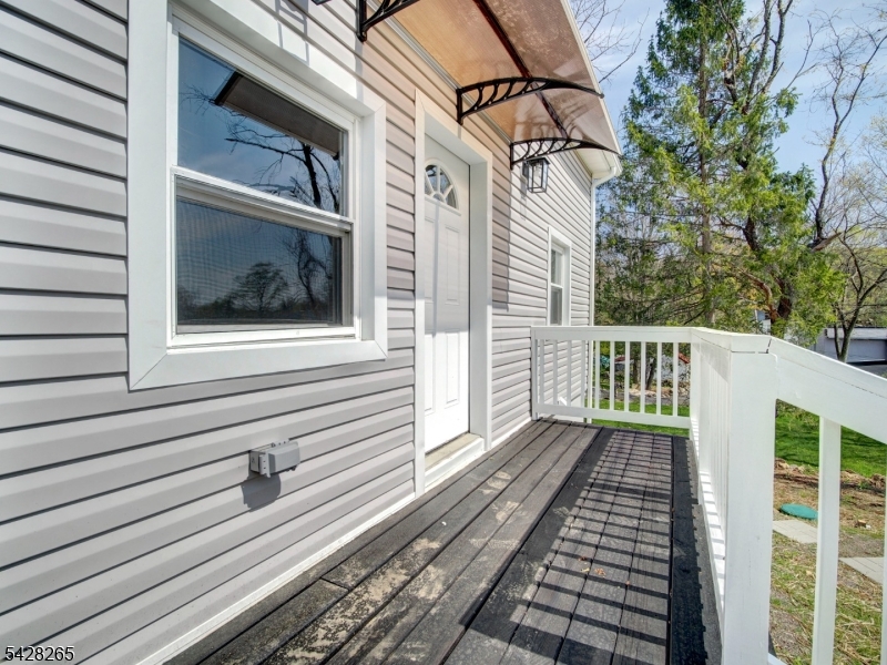 4 Emmans Road Ledgewood, NJ 07852 - Photo 5 of 25 a view of a balcony with wooden floor