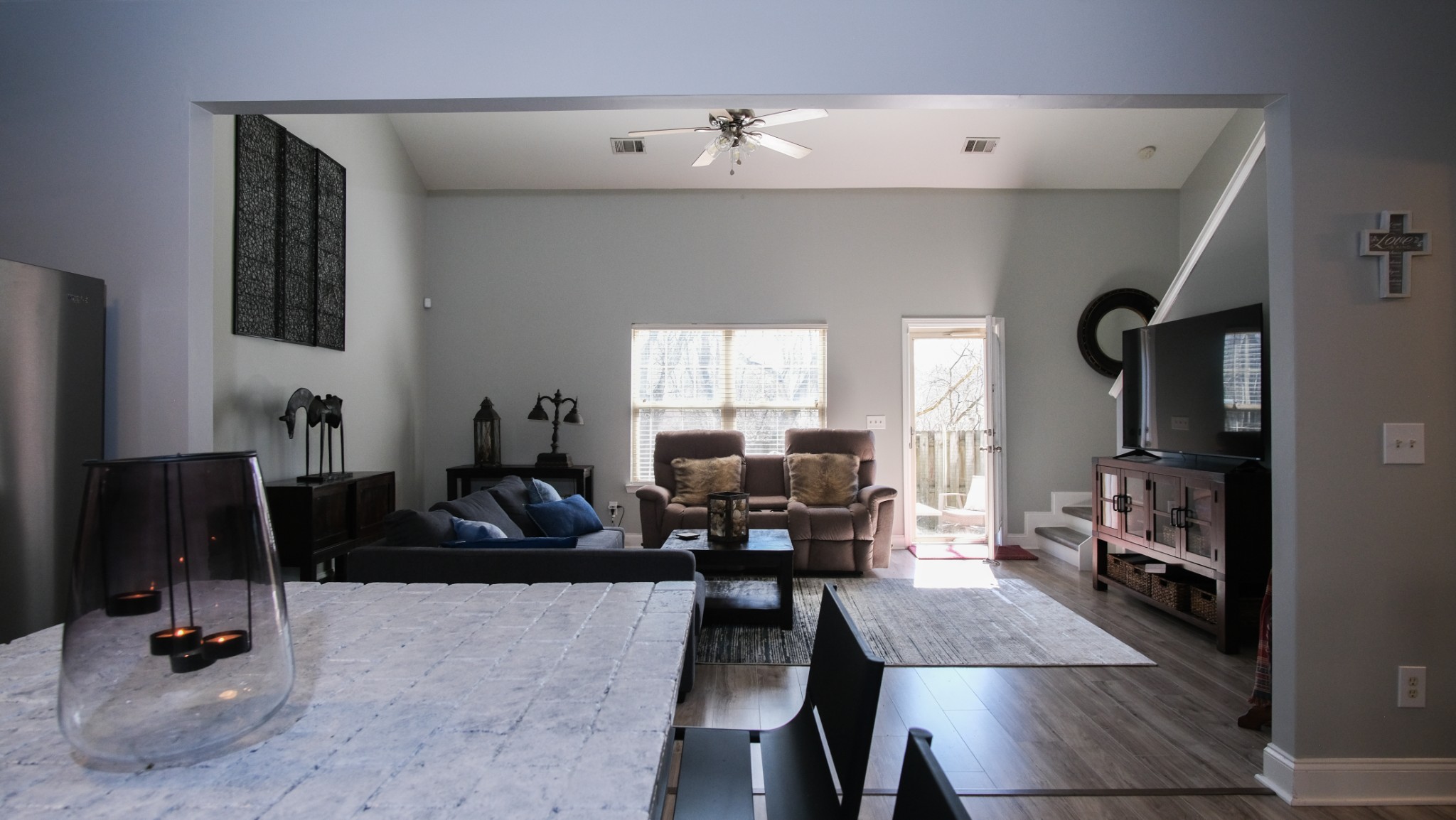 735 Tulip Grove Road, Unit 122 Hermitage, TN 37076 - Photo 11 of 39 a living room with furniture and a fireplace