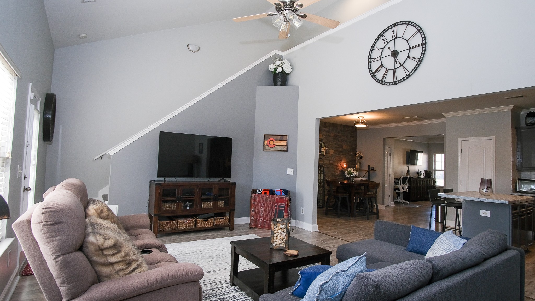 735 Tulip Grove Road, Unit 122 Hermitage, TN 37076 - Photo 14 of 39 a living room with furniture a window and a flat screen tv