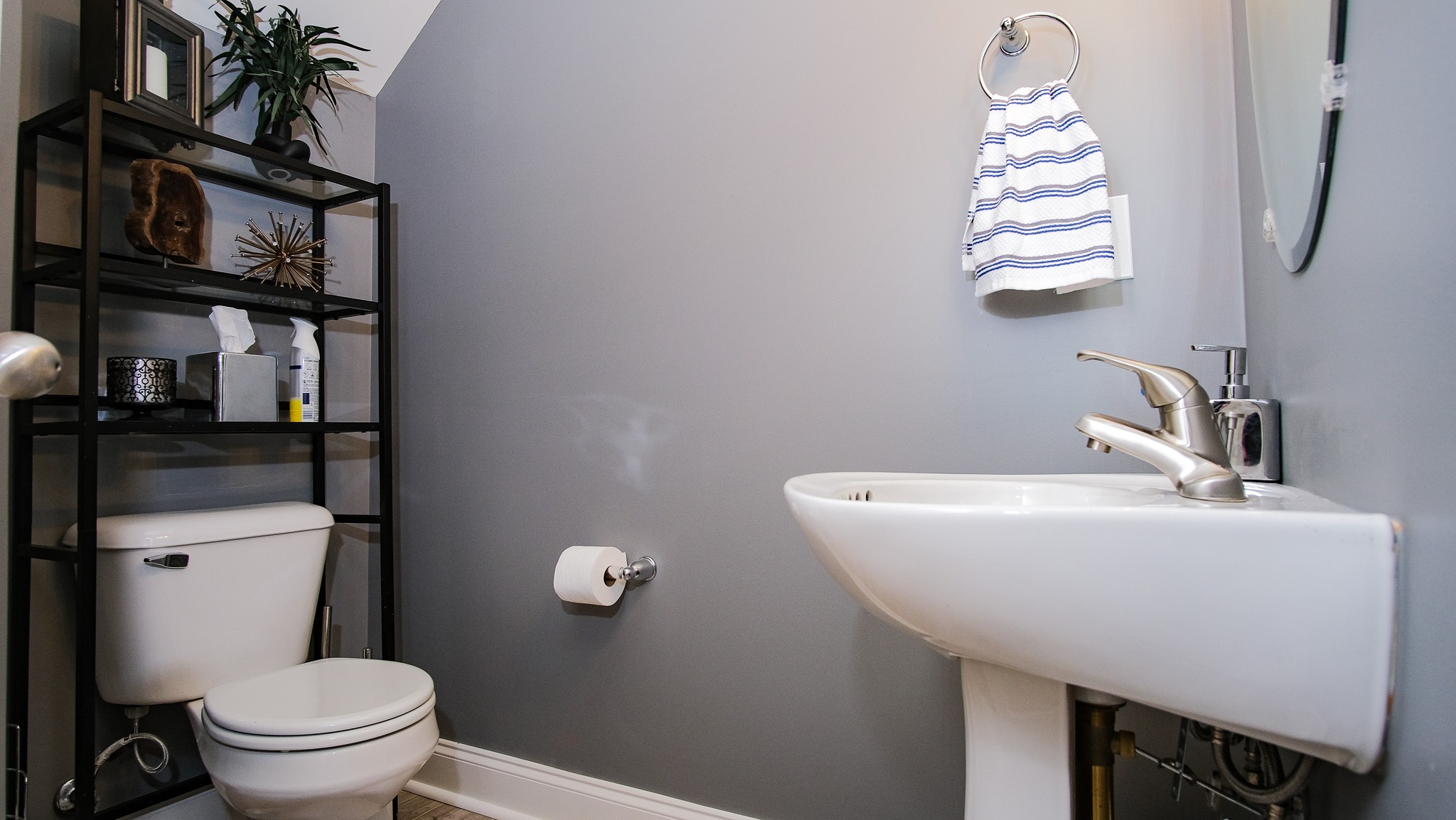 735 Tulip Grove Road, Unit 122 Hermitage, TN 37076 - Photo 16 of 39 a bathroom with a sink a toilet and shower curtain