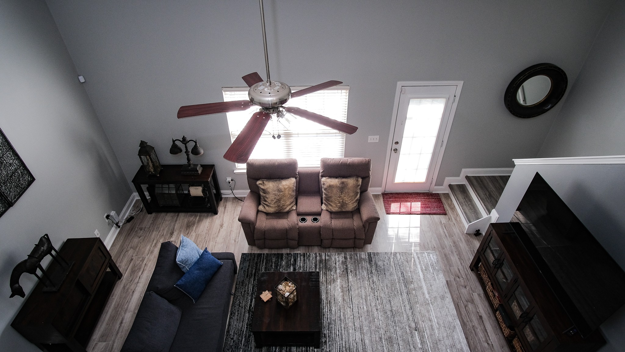 735 Tulip Grove Road, Unit 122 Hermitage, TN 37076 - Photo 19 of 39 a living room with furniture and a flat screen tv