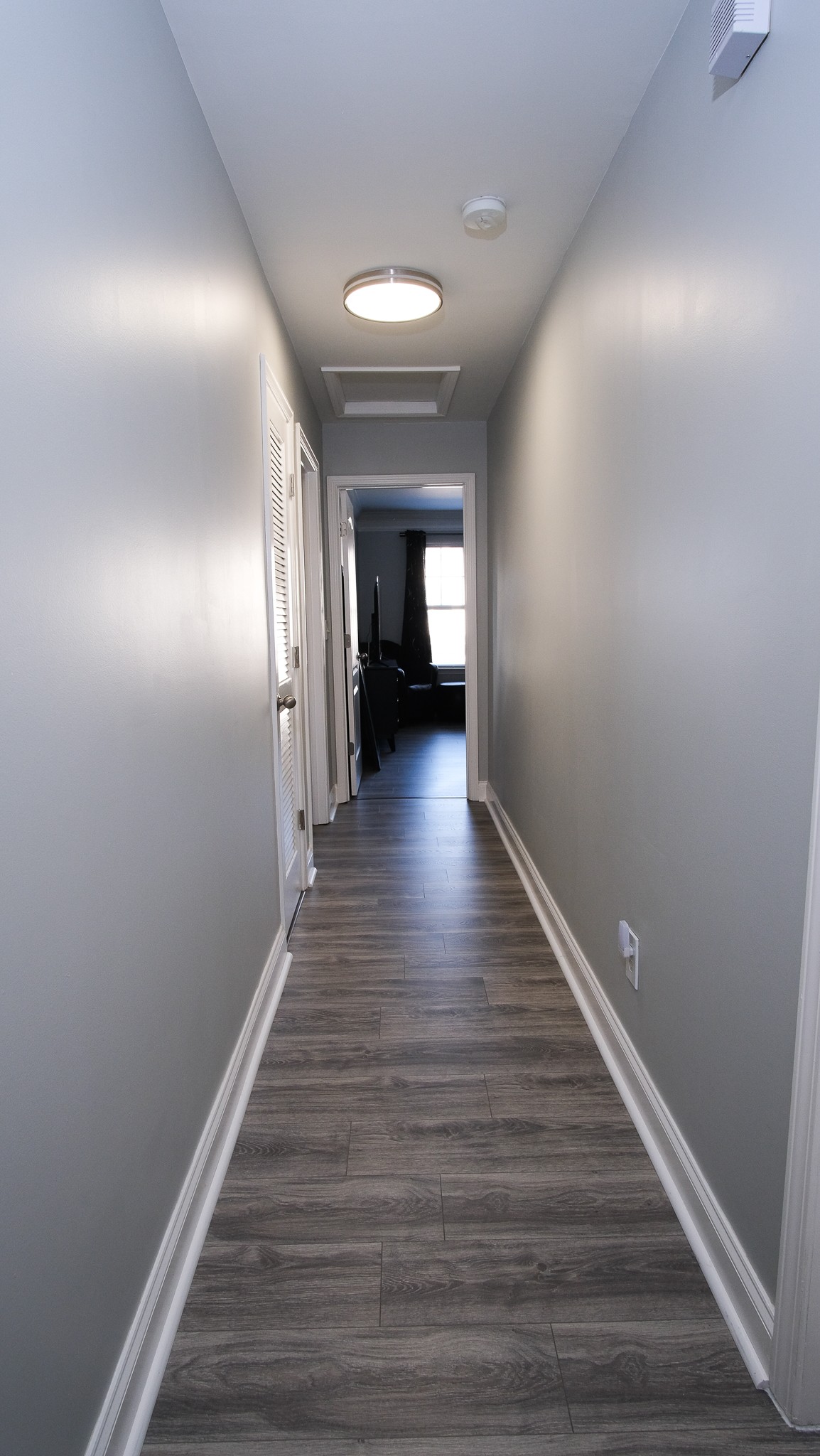 735 Tulip Grove Road, Unit 122 Hermitage, TN 37076 - Photo 20 of 39 a view of a hallway with wooden floor
