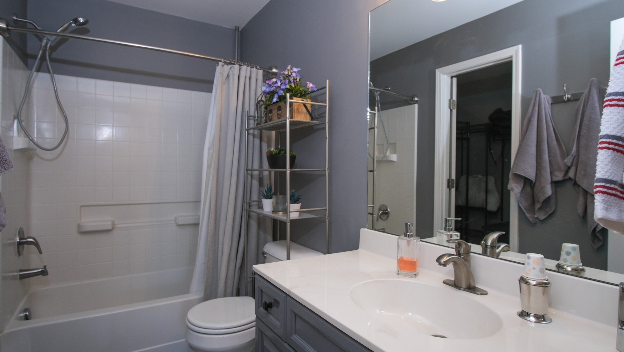 735 Tulip Grove Road, Unit 122 Hermitage, TN 37076 - Photo 24 of 39 a bathroom with a sink toilet and shower