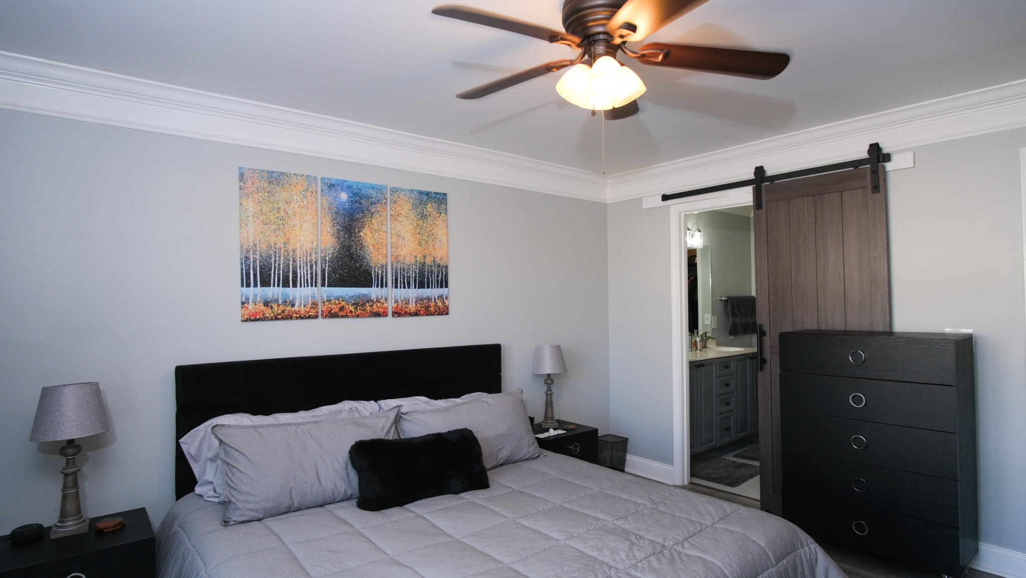 735 Tulip Grove Road, Unit 122 Hermitage, TN 37076 - Photo 26 of 39 a bedroom with a bed and wooden floor
