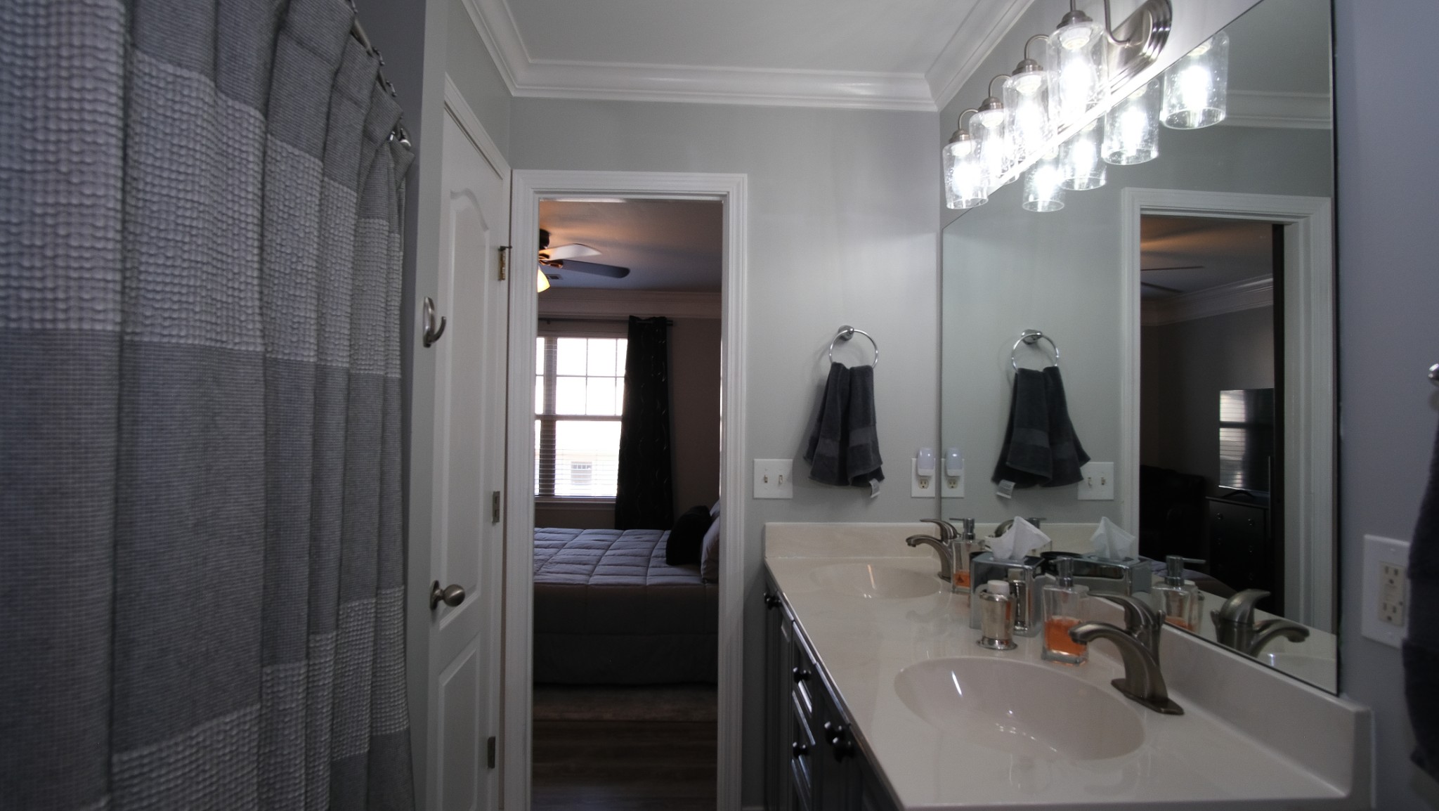 735 Tulip Grove Road, Unit 122 Hermitage, TN 37076 - Photo 30 of 39 a bathroom with double vanity sinks and a mirror