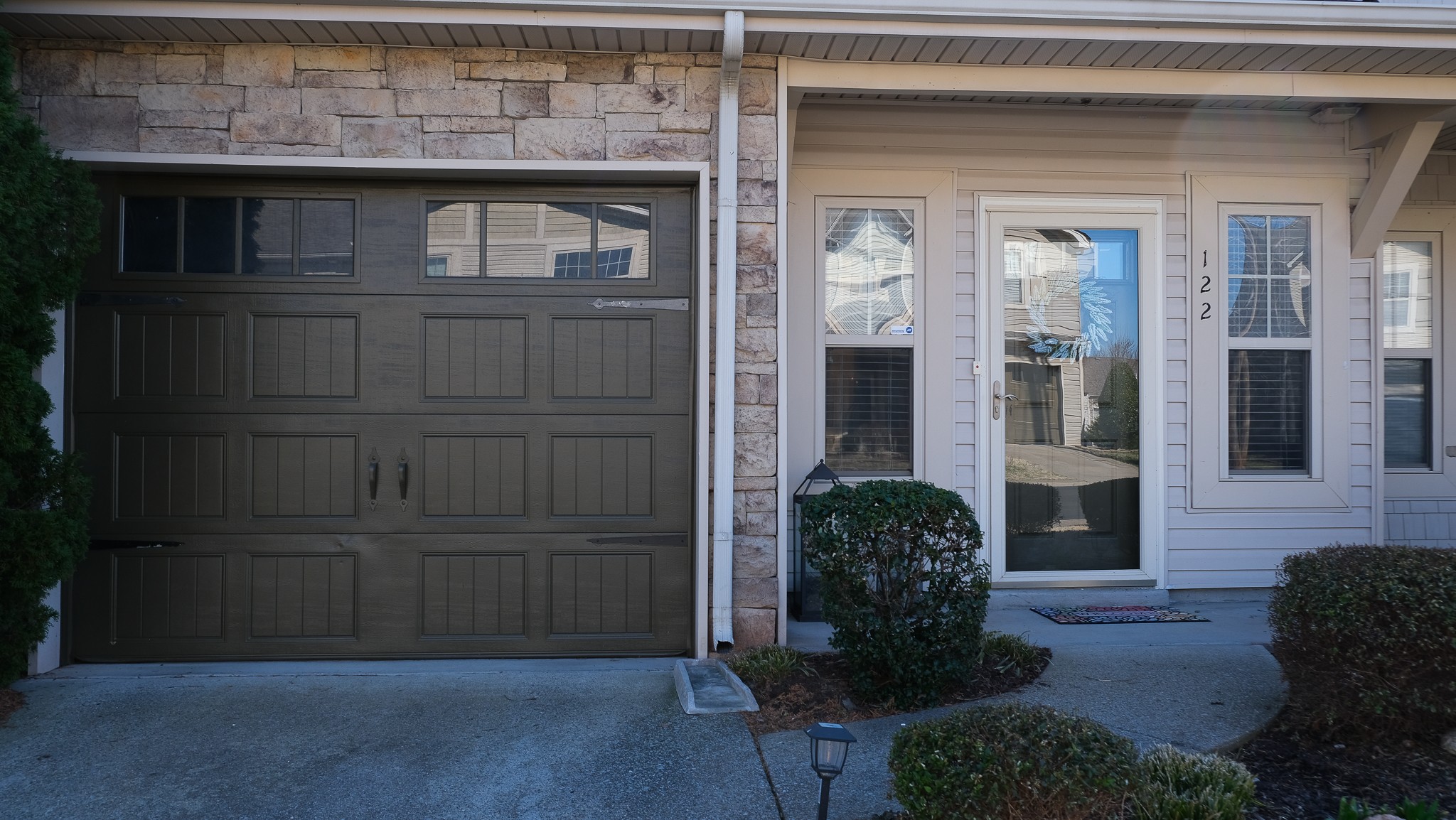 735 Tulip Grove Road, Unit 122 Hermitage, TN 37076 - Photo 4 of 39 a front view of a house with entryway