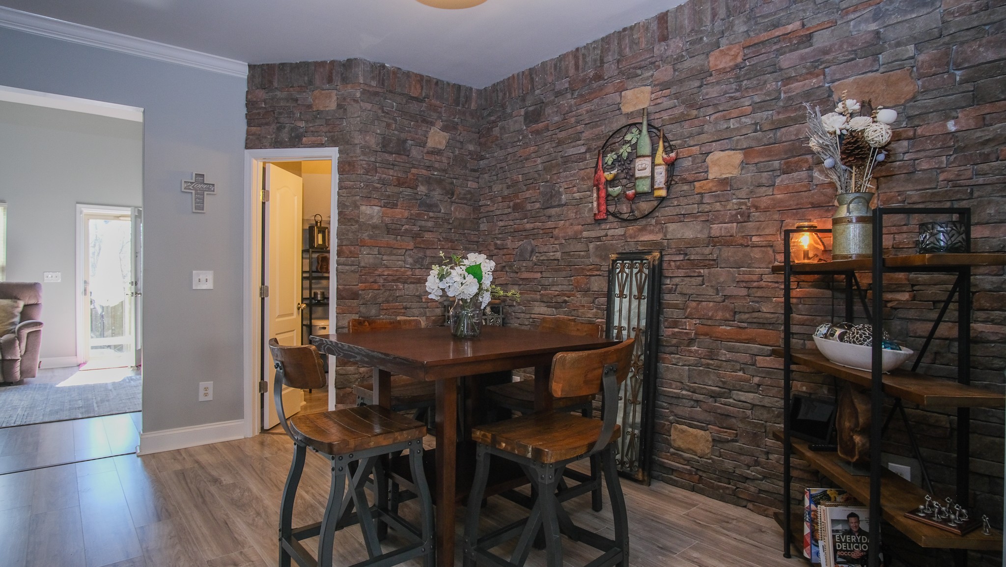 735 Tulip Grove Road, Unit 122 Hermitage, TN 37076 - Photo 7 of 39 a dining room with furniture and wooden floor