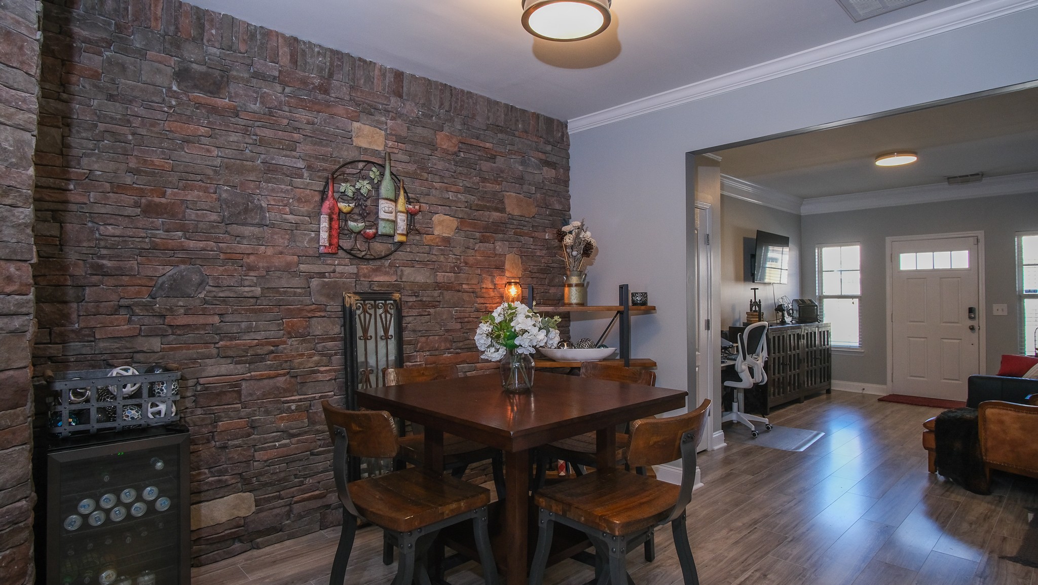 735 Tulip Grove Road, Unit 122 Hermitage, TN 37076 - Photo 8 of 39 a view of a dining room with furniture and wooden floor