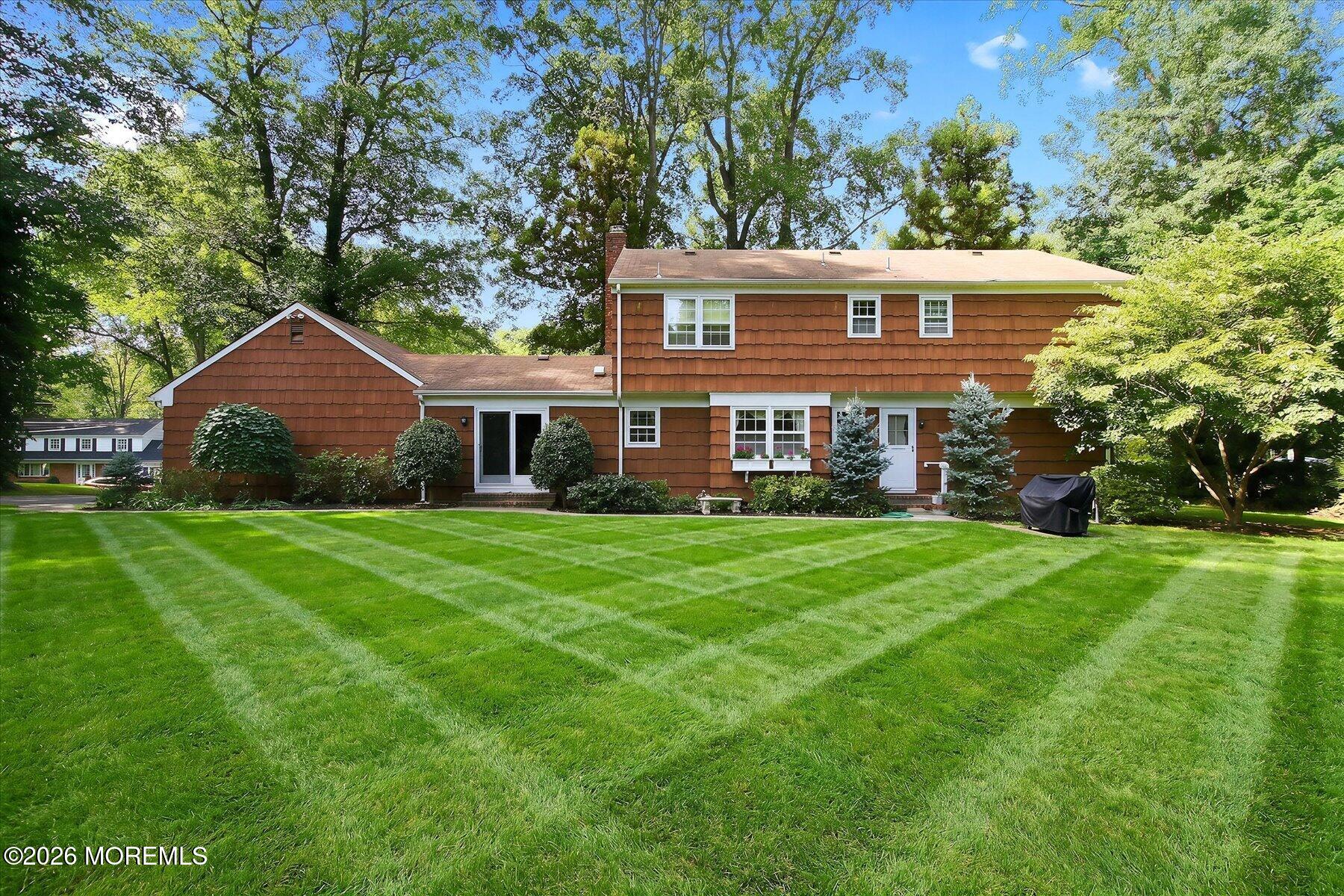 76 Tall Timber Road Middletown, NJ 07748 - Photo 43 of 47 43-Rear 1 with grass enhancement