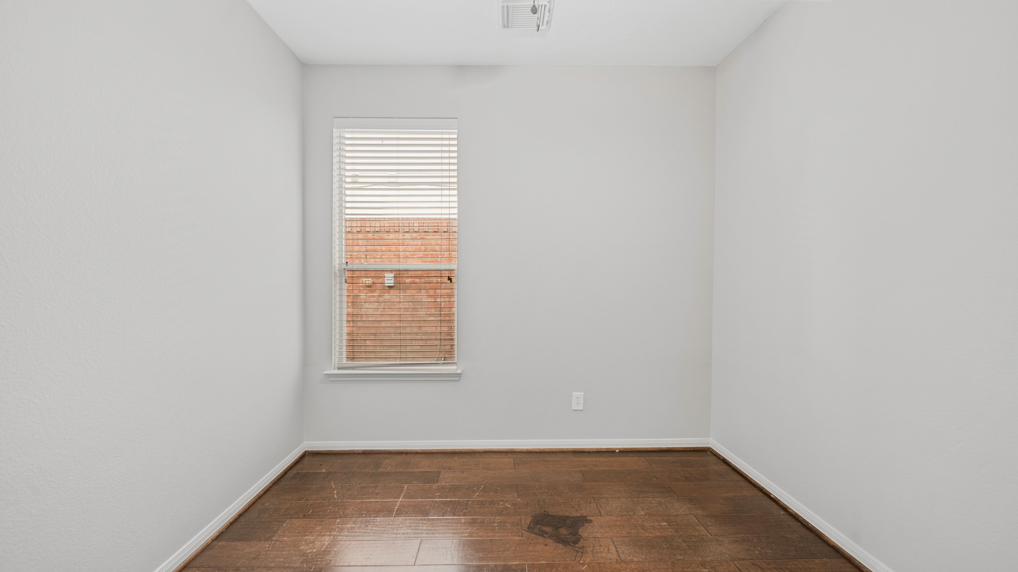 15710 Flagstone Walk Way Houston, TX 77049 - Photo 19 of 27 a view of a room that has a window in it