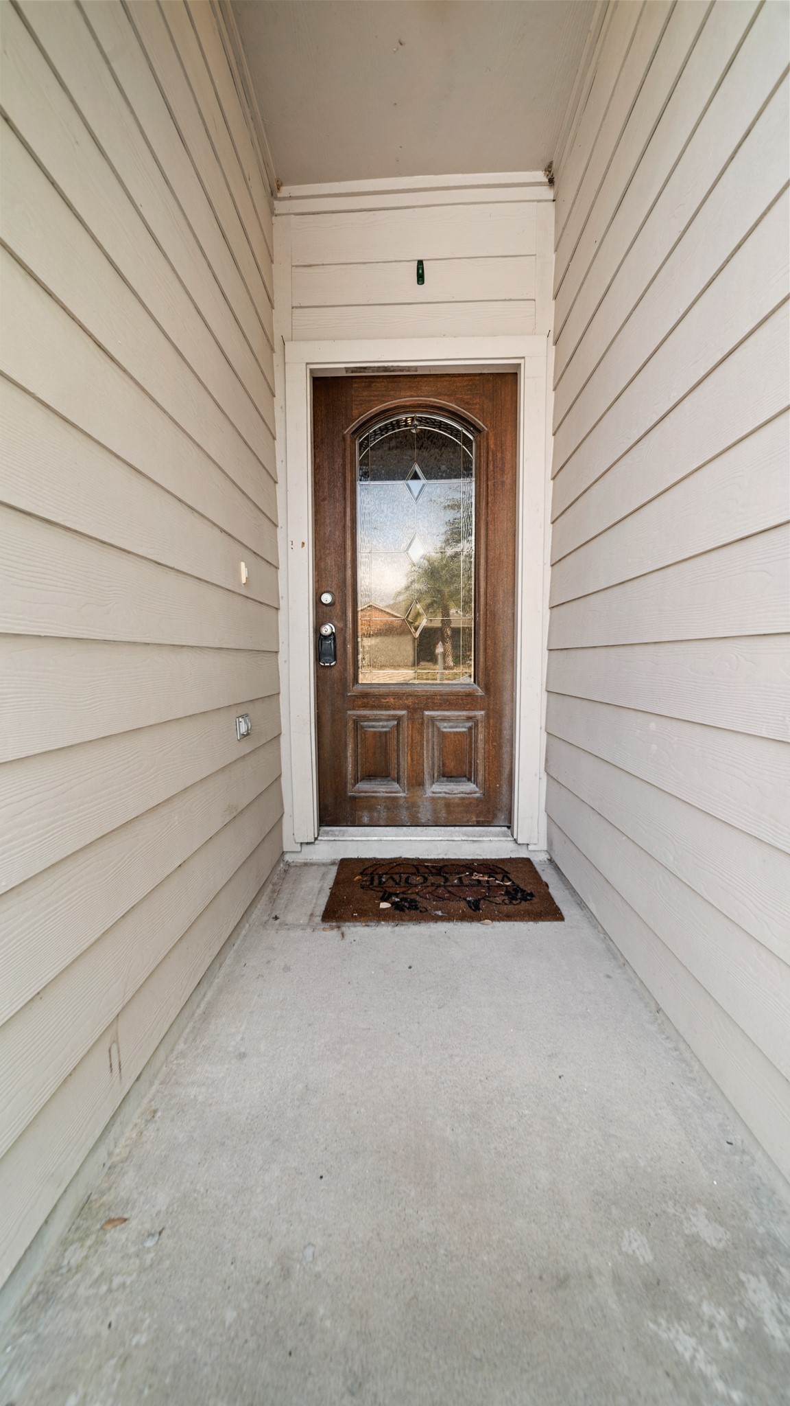 15710 Flagstone Walk Way Houston, TX 77049 - Photo 2 of 27 a view of an empty room and window