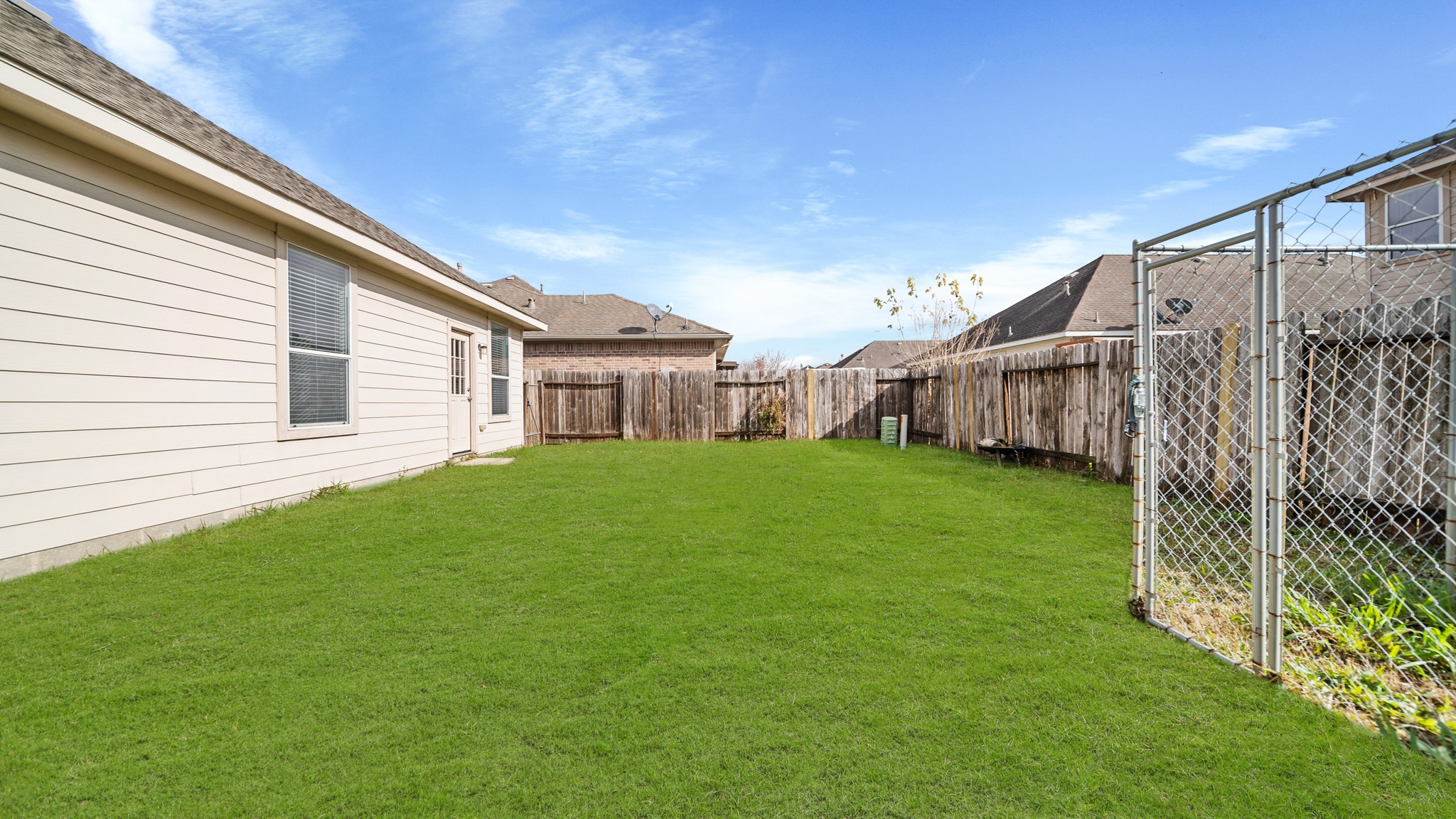 15710 Flagstone Walk Way Houston, TX 77049 - Photo 25 of 27 a house view with garden space