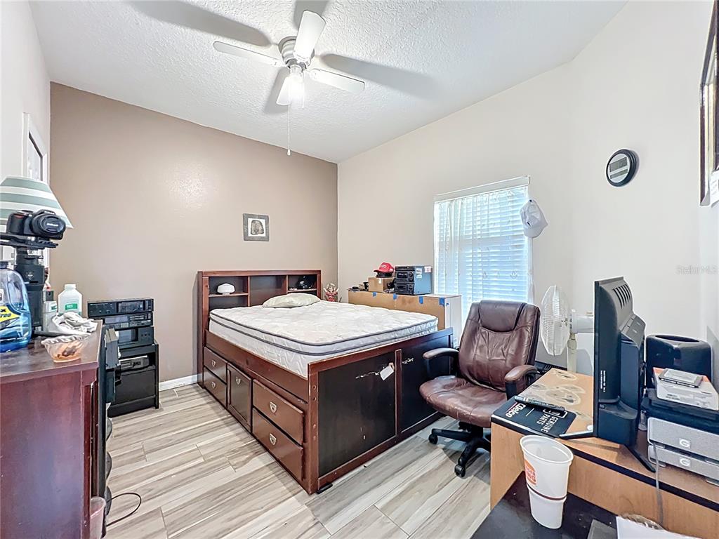 676 Sandy Neck Lane, Unit 101 Altamonte Springs, FL 32714 - Photo 13 of 24 a view of livingroom with workspace and a window