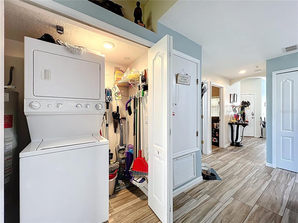 676 Sandy Neck Lane, Unit 101 Altamonte Springs, FL 32714 - Photo 19 of 24 a view of a hallway with washer and dryer