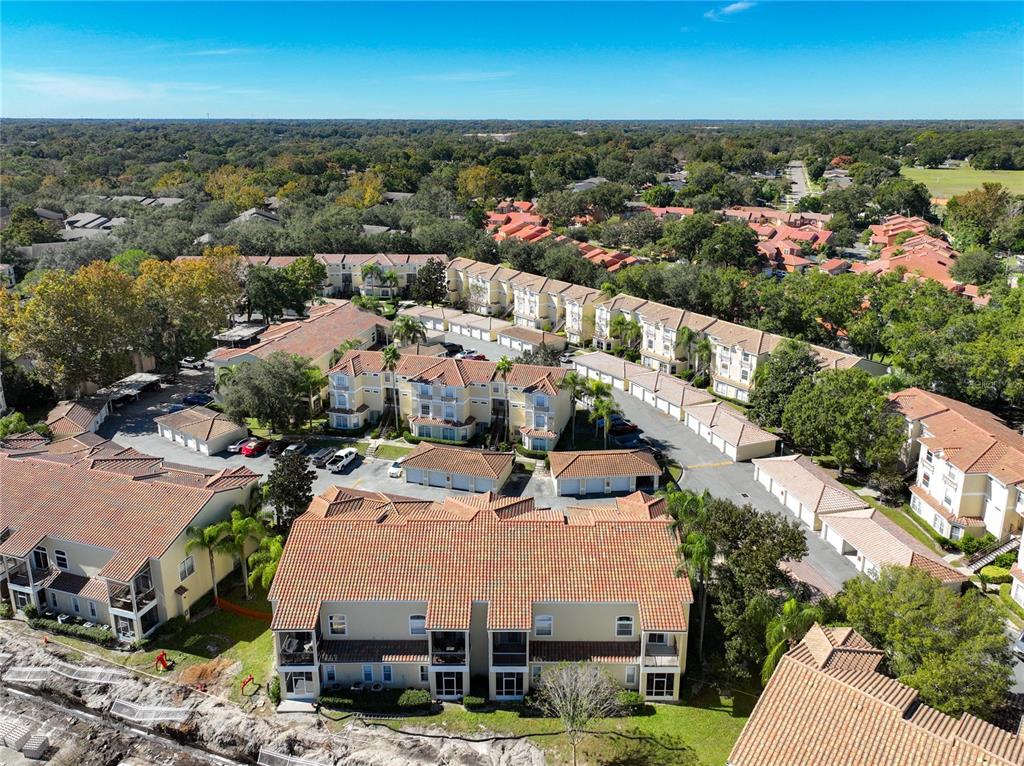 676 Sandy Neck Lane, Unit 101 Altamonte Springs, FL 32714 - Photo 21 of 24 an aerial view of a house with a outdoor space