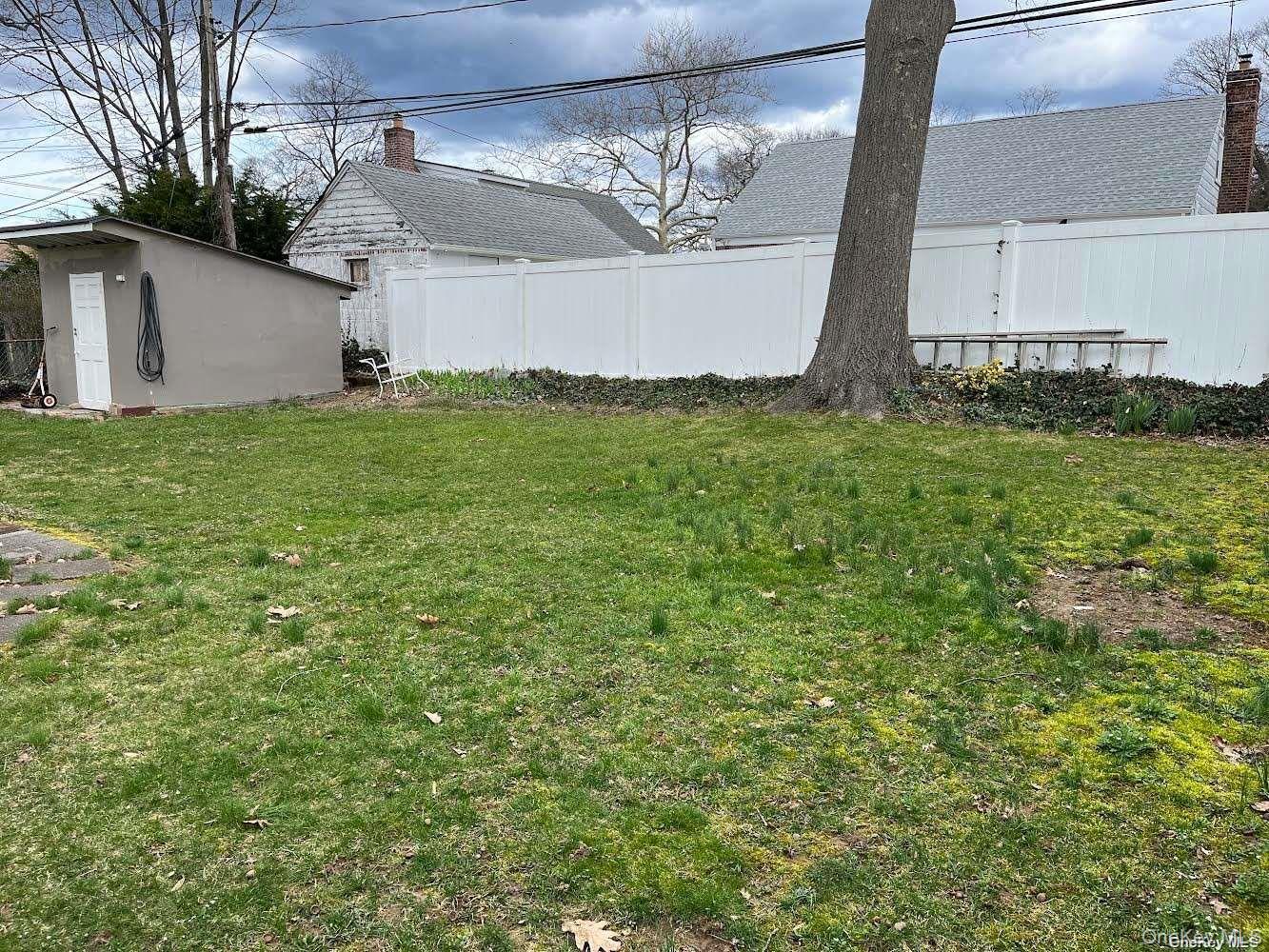 26 Purdue Road Glen Cove, NY 11542 - Photo 12 of 17 Large level backyard