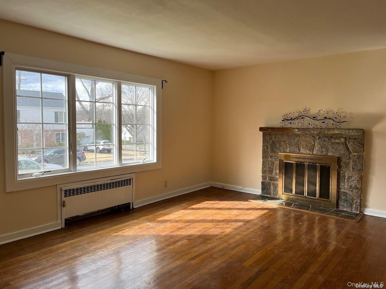 26 Purdue Road Glen Cove, NY 11542 - Photo 2 of 17 Living room with lovely sunlight