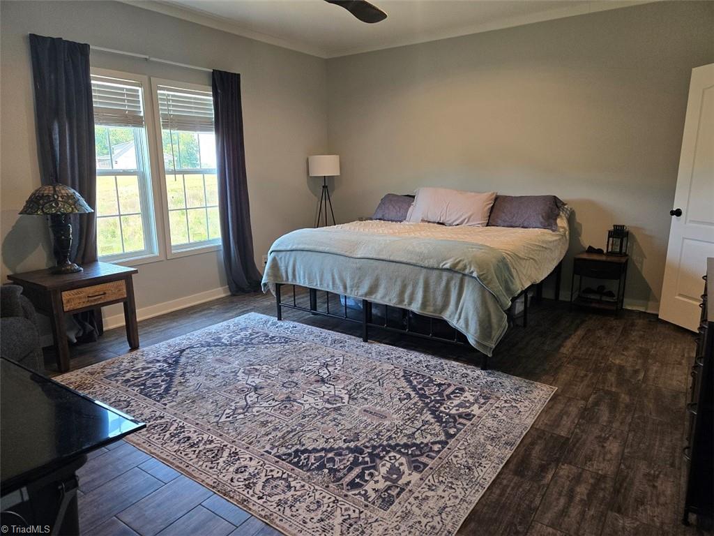 1266 Quaker Church Road Siloam, NC 27047 - Photo 16 of 29 Main bedroom - all rooms have upgraded ceiling fans.