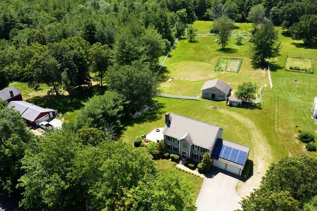 90 Benjamin Road Shirley, MA 01464 - Photo 33 of 41 an aerial view of residential houses with outdoor space and swimming pool
