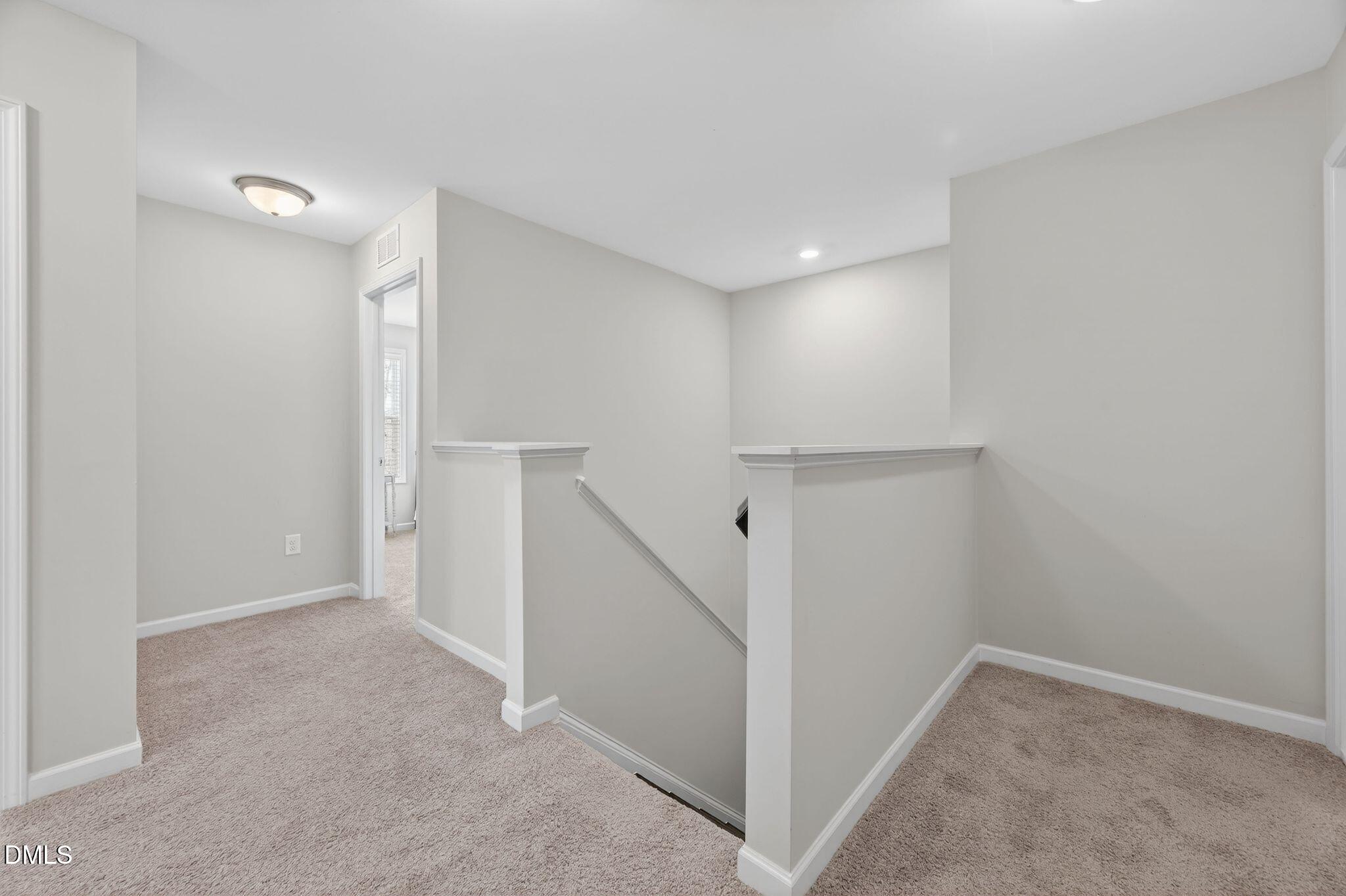 528 Spring Flower Court Cary, NC 27511 - Photo 35 of 51 a view of hallway with stairs