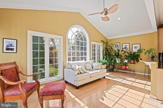 a view of a kitchen from a hallway