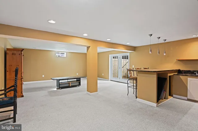 a big room with furniture and window