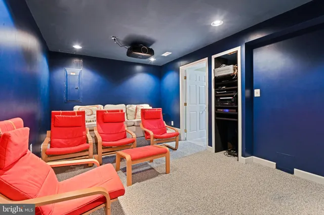 a projector room with a couch