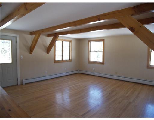 4 Charles Hill Road Kittery, ME 03905 - Photo 2 of 9 Living Room. Sun drenched open...
