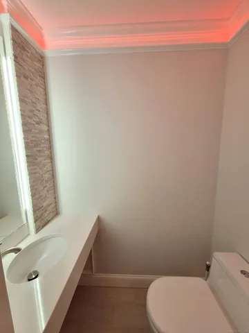 a bathroom with a toilet and a sink