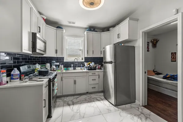 $450,000 | 8942 South Baltimore Avenue, Chicago, IL 60617