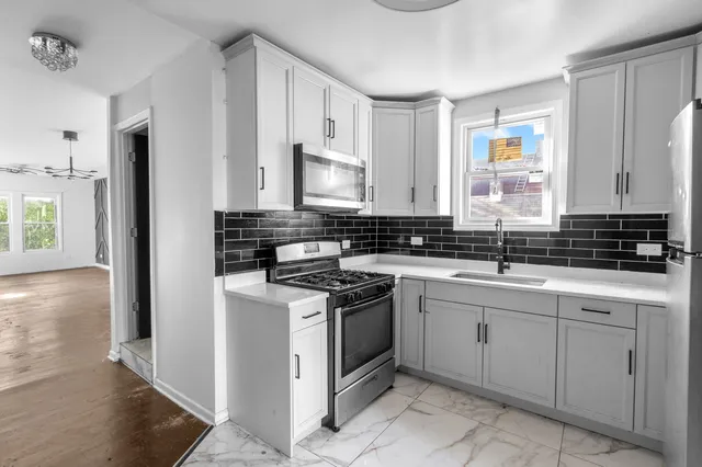 $450,000 | 8942 South Baltimore Avenue, Chicago, IL 60617