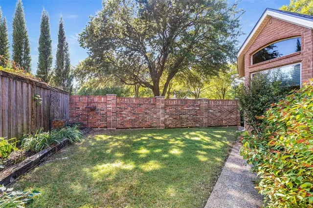 a view of a pathway along a garden