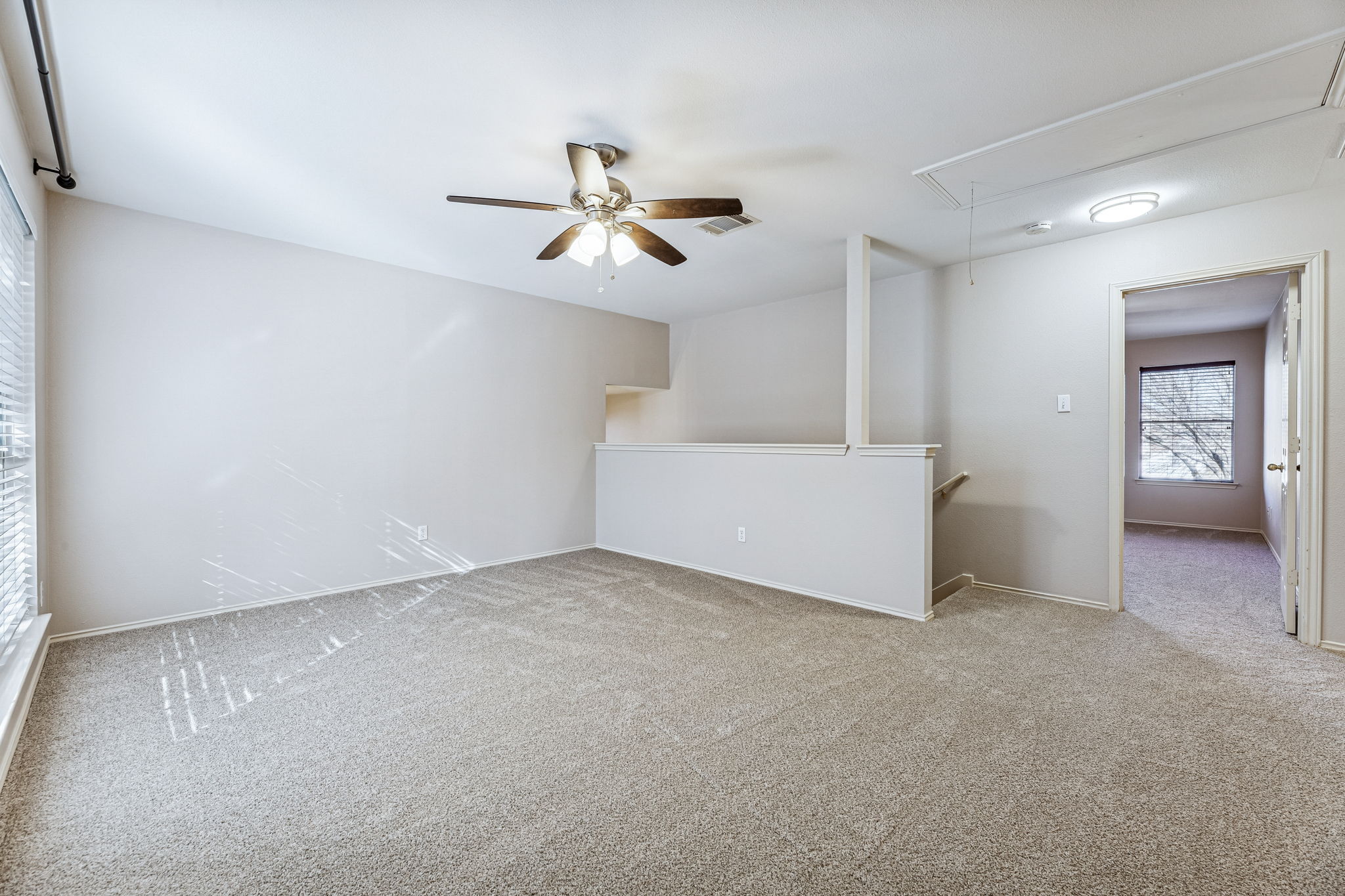 1608 Melibee Trail Austin, TX 78748 - Photo 16 of 29 an empty room with windows and fan