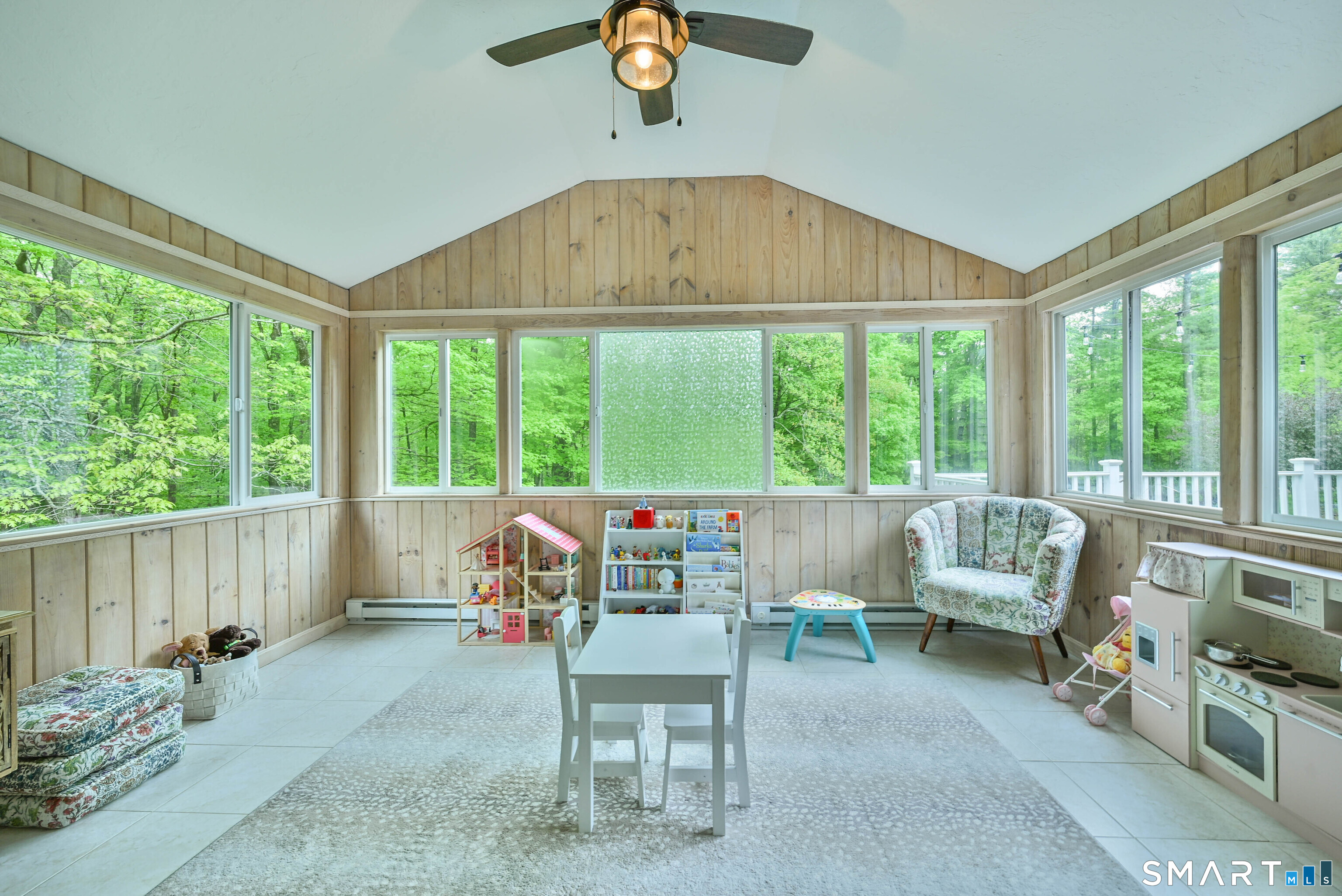 309 O'Leary Road Thompson, CT 06277 - Photo 18 of 40 a living room with furniture and large windows