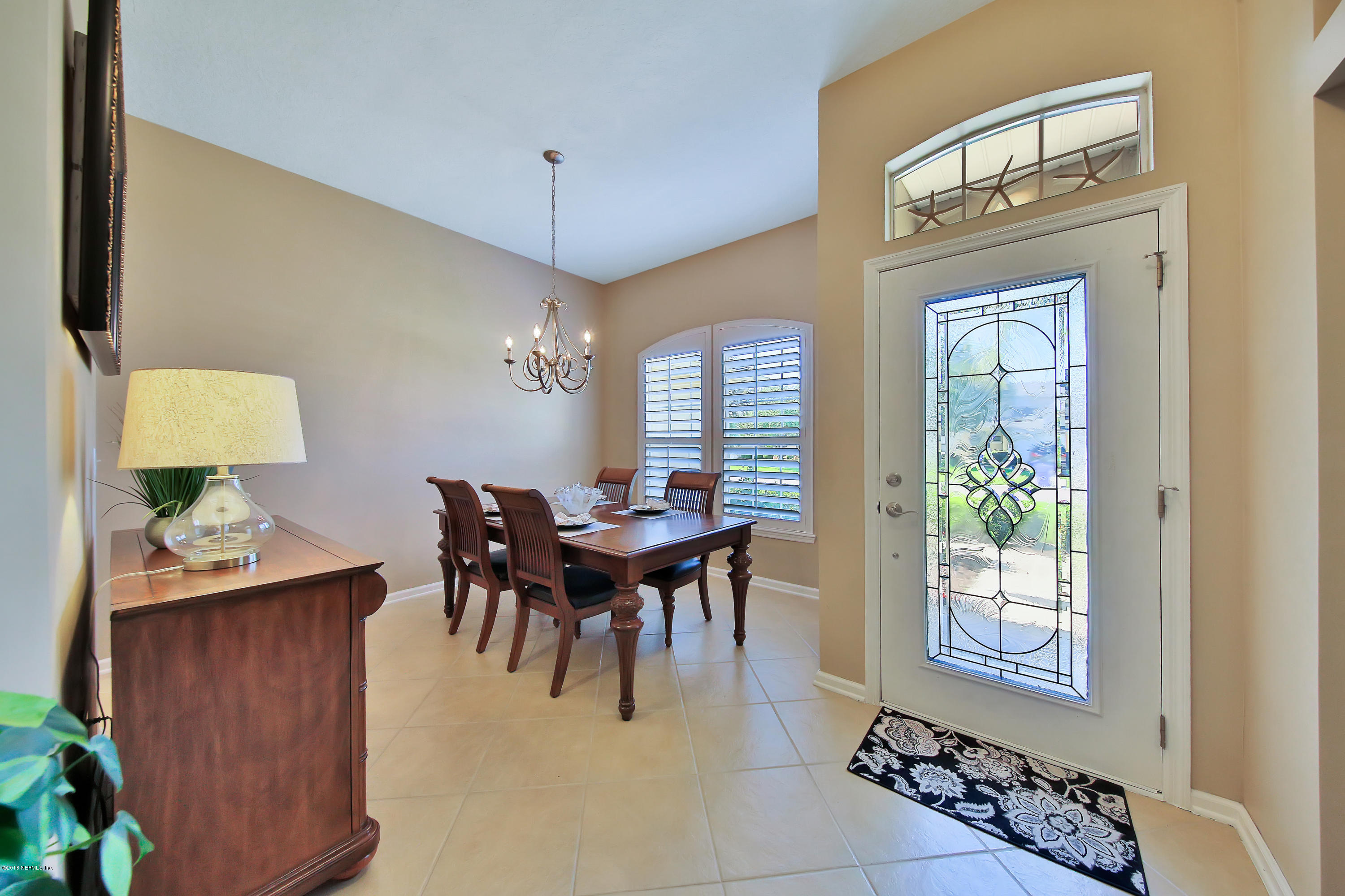 712 Porta Rosa Circle St. Augustine, FL 32092 - Photo 2 of 34 a view of a livingroom with furniture window and wooden floor