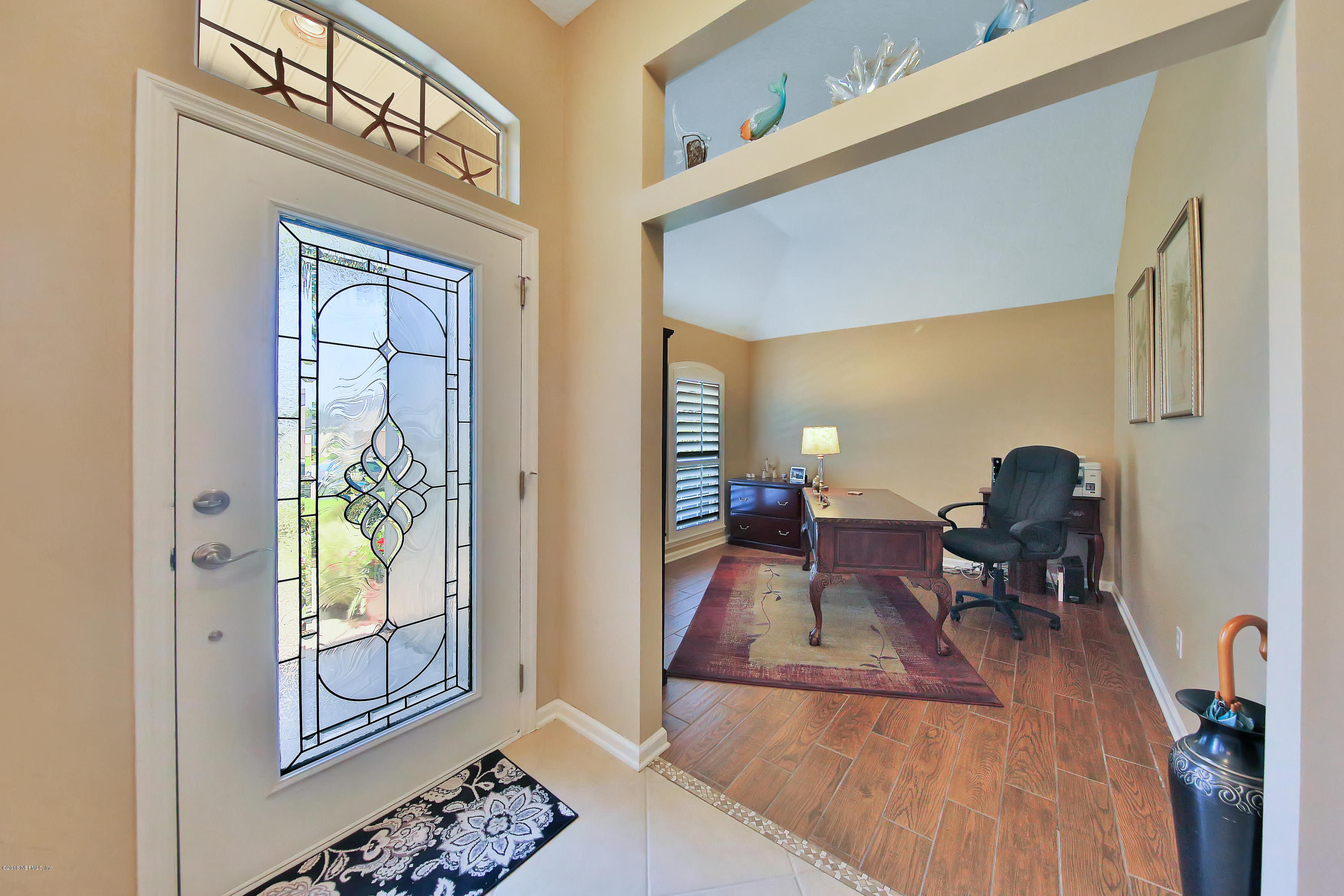 712 Porta Rosa Circle St. Augustine, FL 32092 - Photo 3 of 34 a living room with furniture and a window