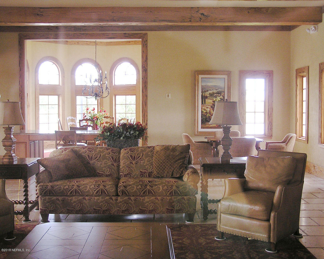 712 Porta Rosa Circle St. Augustine, FL 32092 - Photo 33 of 34 a living room with couches and a potted plant
