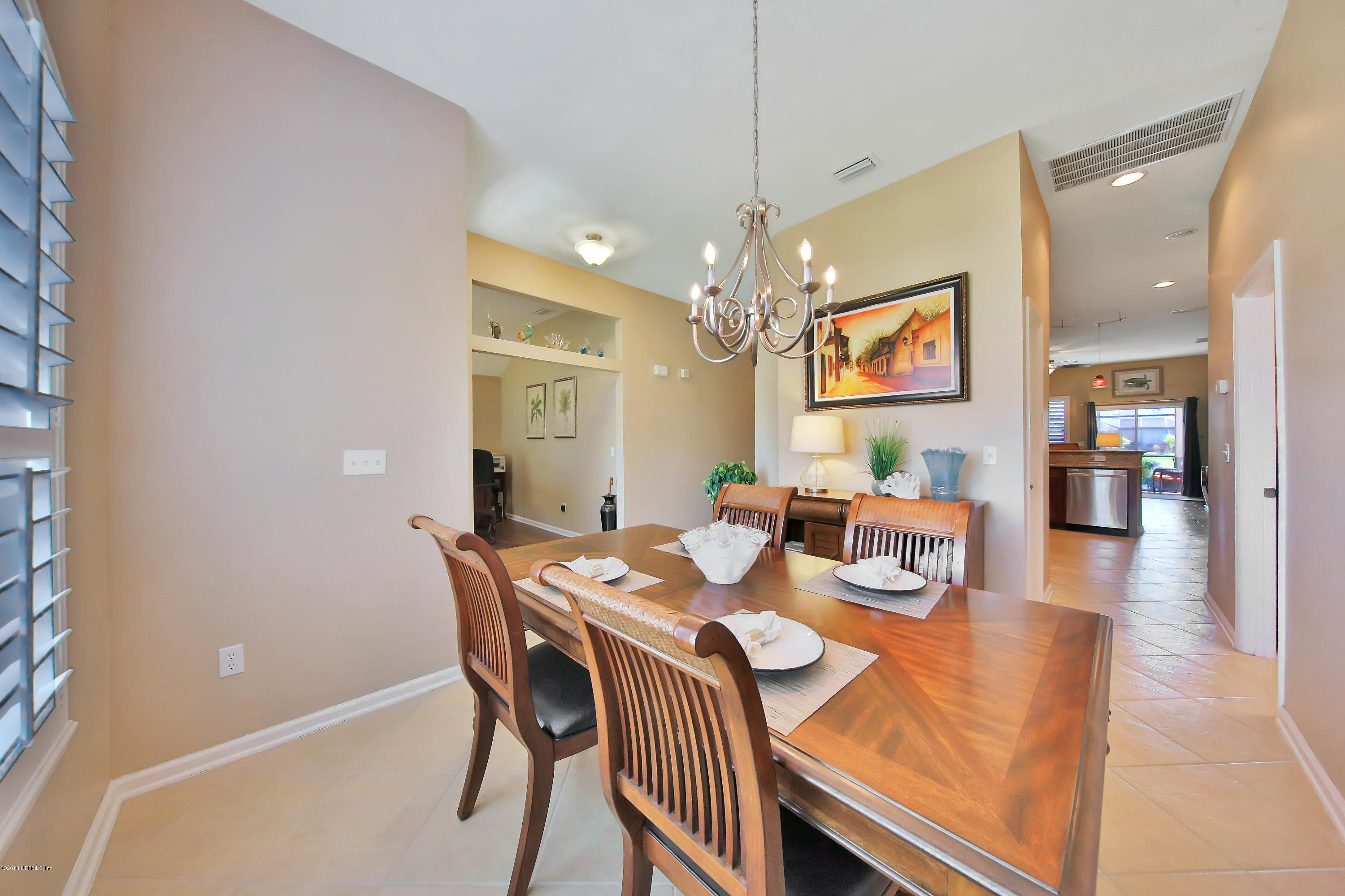712 Porta Rosa Circle St. Augustine, FL 32092 - Photo 4 of 34 a view of a dining room with furniture