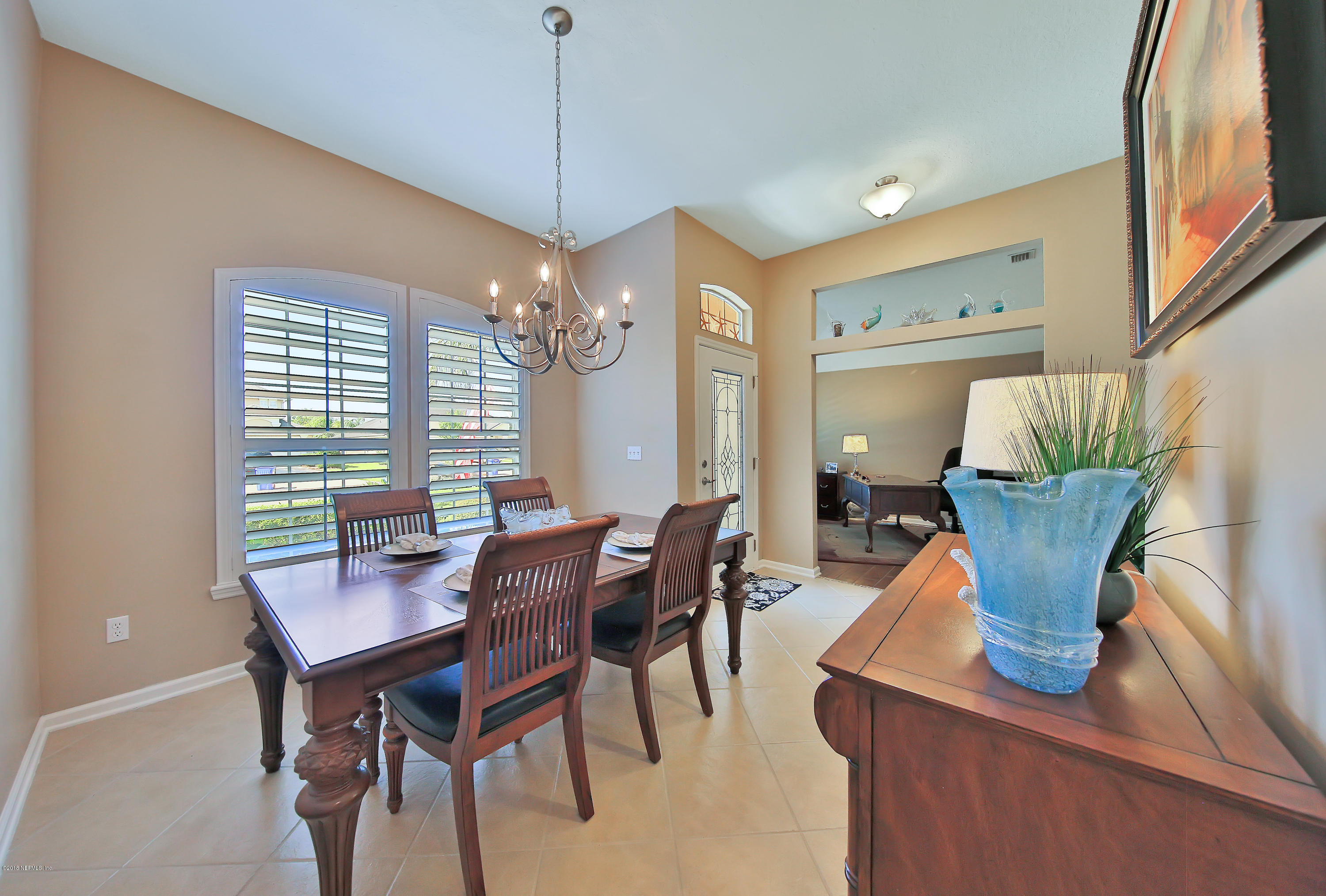 712 Porta Rosa Circle St. Augustine, FL 32092 - Photo 5 of 34 a view of a dining room with furniture window and outside view