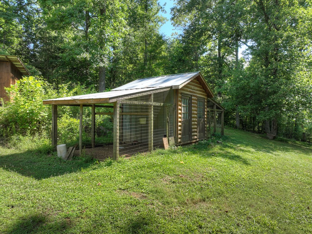 354 Circle Drive Blue Ridge, GA 30513 - Photo 6 of 41 a view of a barn with a yard
