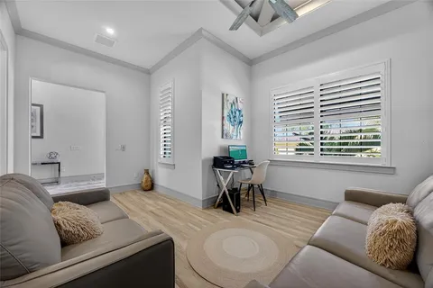 a living room with furniture and a window