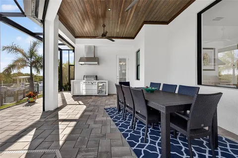 a view of a dining room with furniture wooden floor and a rug