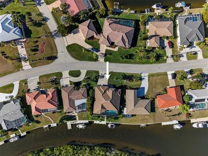 a view of a house with a swimming pool