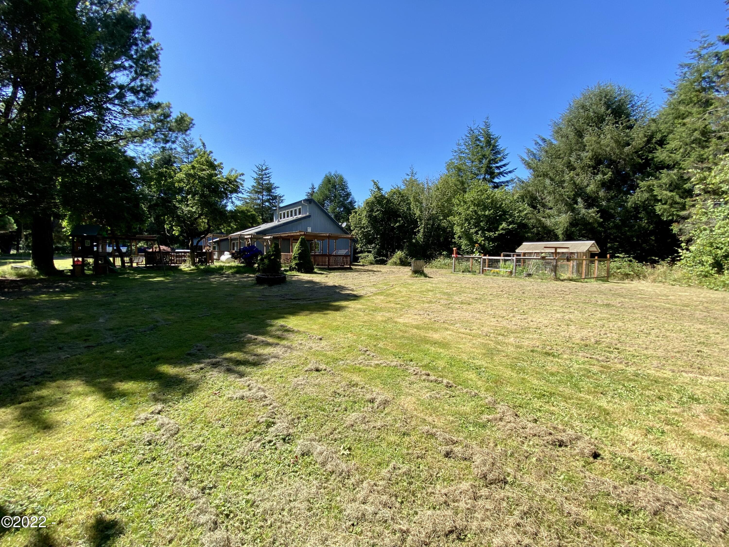 2262 Old River Road Northeast Siletz, OR 97380 - Photo 17 of 18 Side View of Home